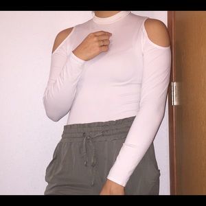 White long sleeve with holes in the shoulders